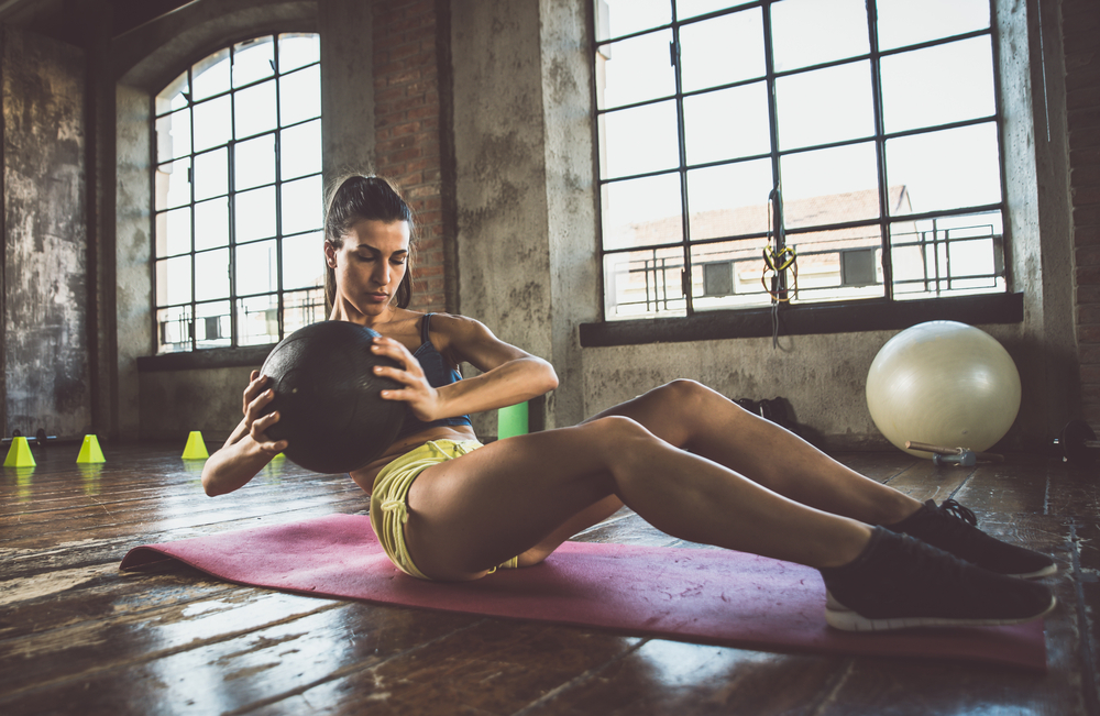 Woman,Training,With,Functional,Gymnastic,In,The,Gym